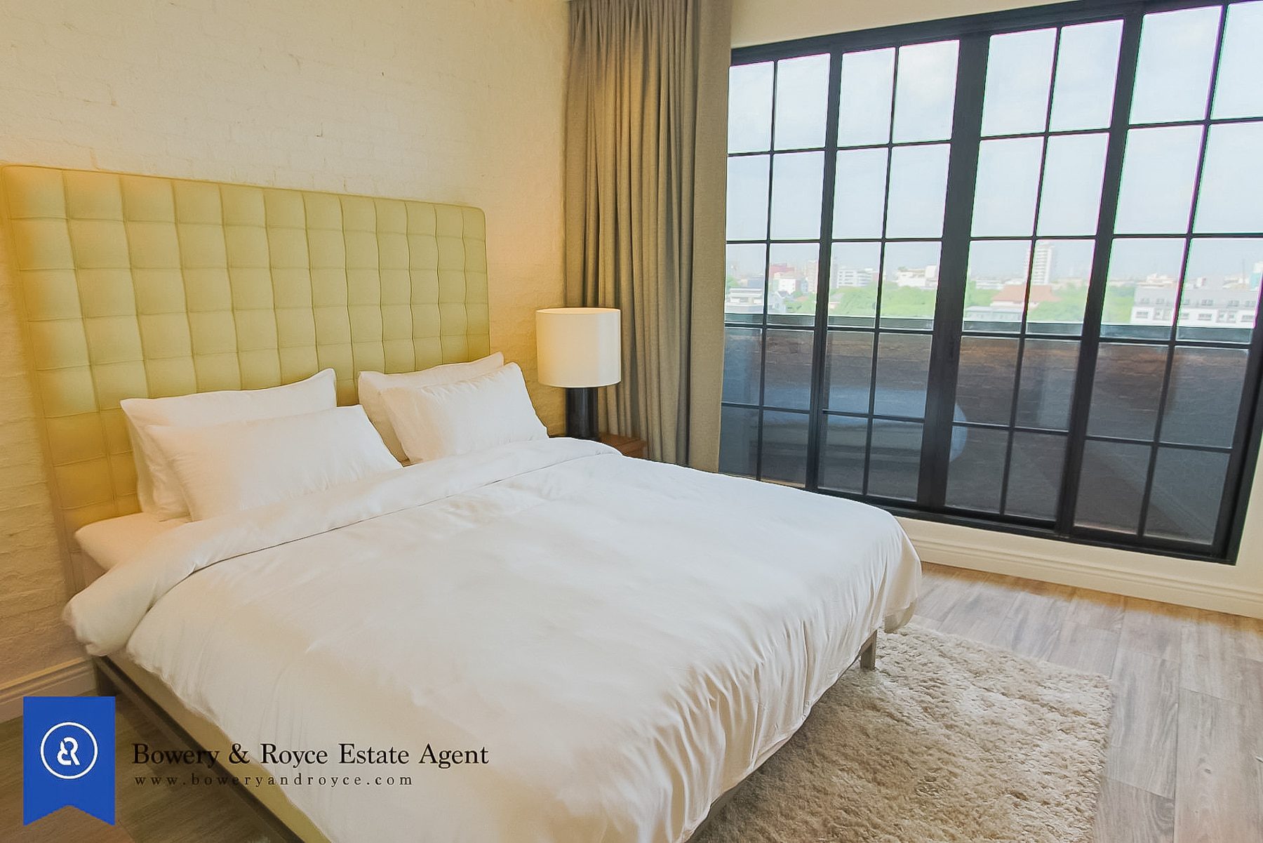 Tranquil & Lofty Two Bedroom Condo with Private Garden for Rent in Ekkamai