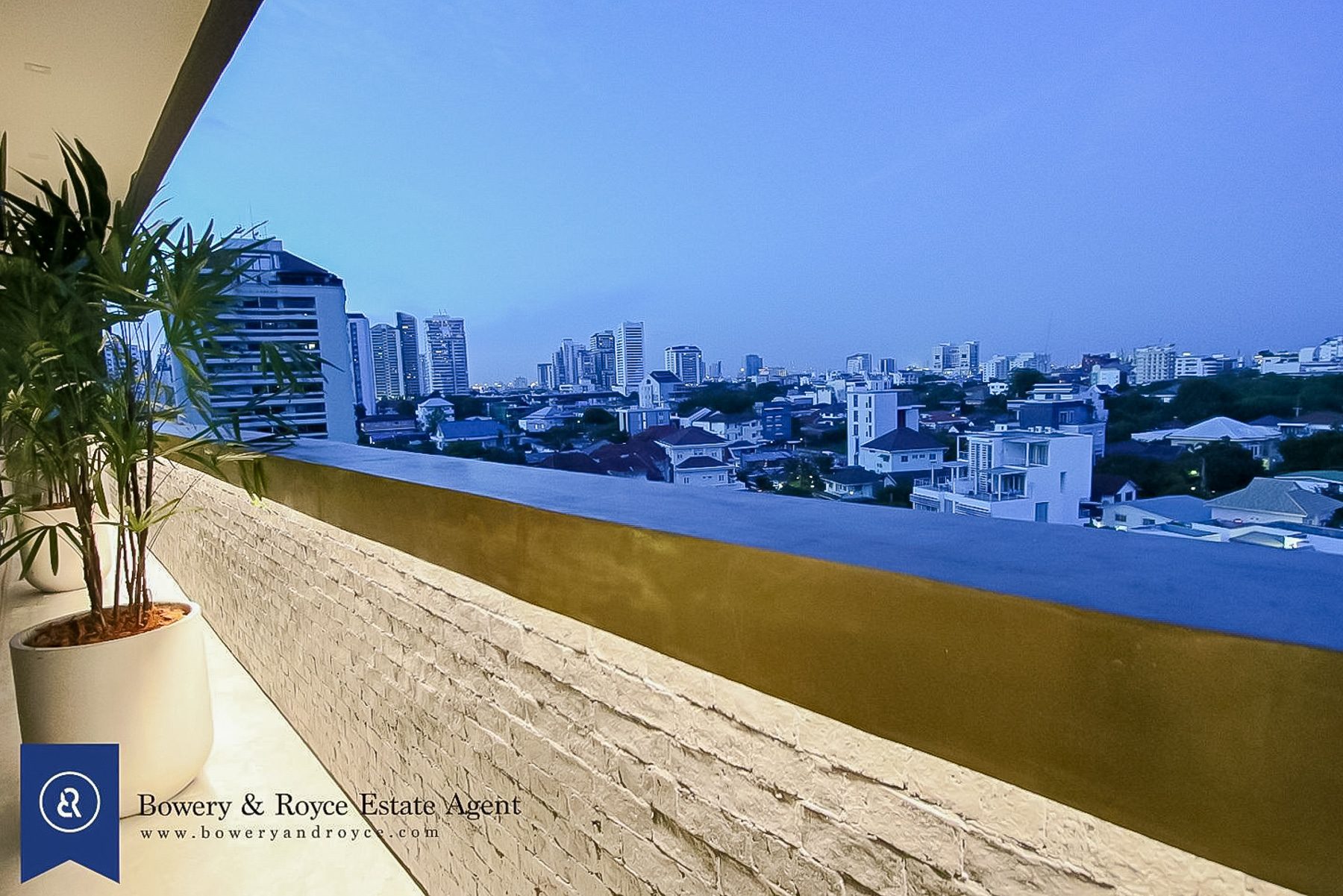 Tranquil & Lofty Two Bedroom Condo with Private Garden for Rent in Ekkamai