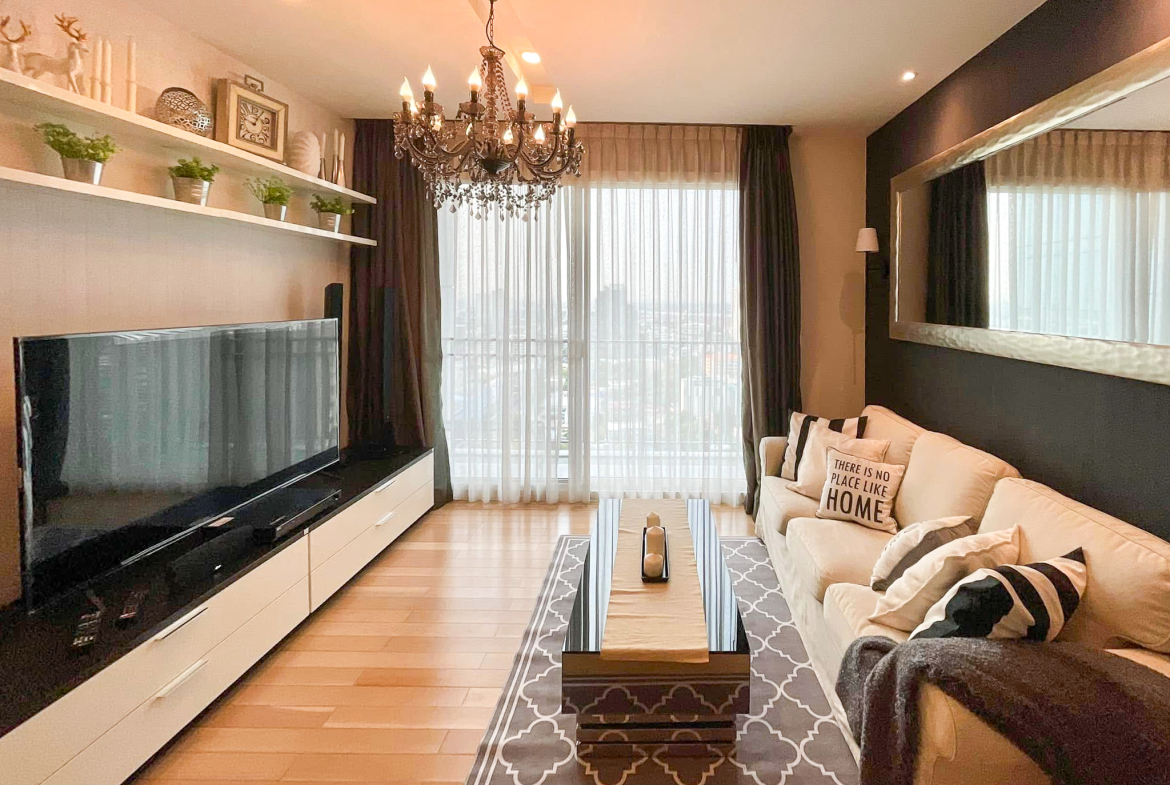 Luxury 2-bedroom condo at SIRI at Sukhumvit for rent and sale. Just 2 minutes walk to BTS Thong Lor. 24th floor with pool view, fully furnished, modern design. Rent 65,000 THB/month or buy for 15.5M THB.