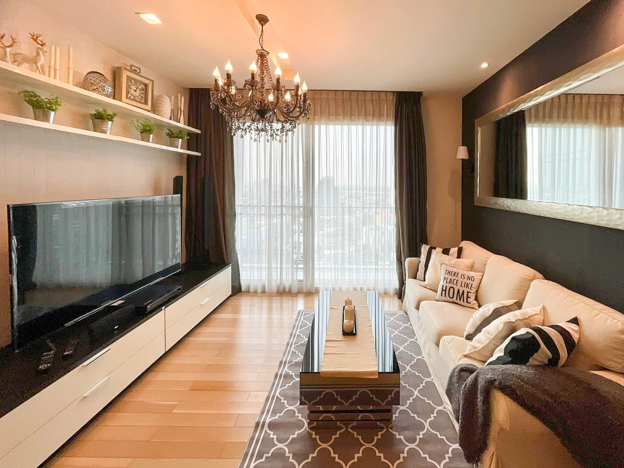 Luxury 2-bedroom condo at SIRI at Sukhumvit for rent and sale. Just 2 minutes walk to BTS Thong Lor. 24th floor with pool view, fully furnished, modern design. Rent 65,000 THB/month or buy for 15.5M THB.