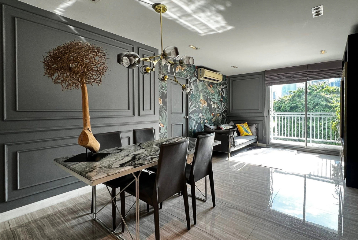 Stylish 2-bedroom condo for rent on Sukhumvit Soi 51 near BTS Thonglor. 80 sqm, peaceful location with green views, designer interiors, walk to EmQuartier & cafes. 48,000 THB/month.