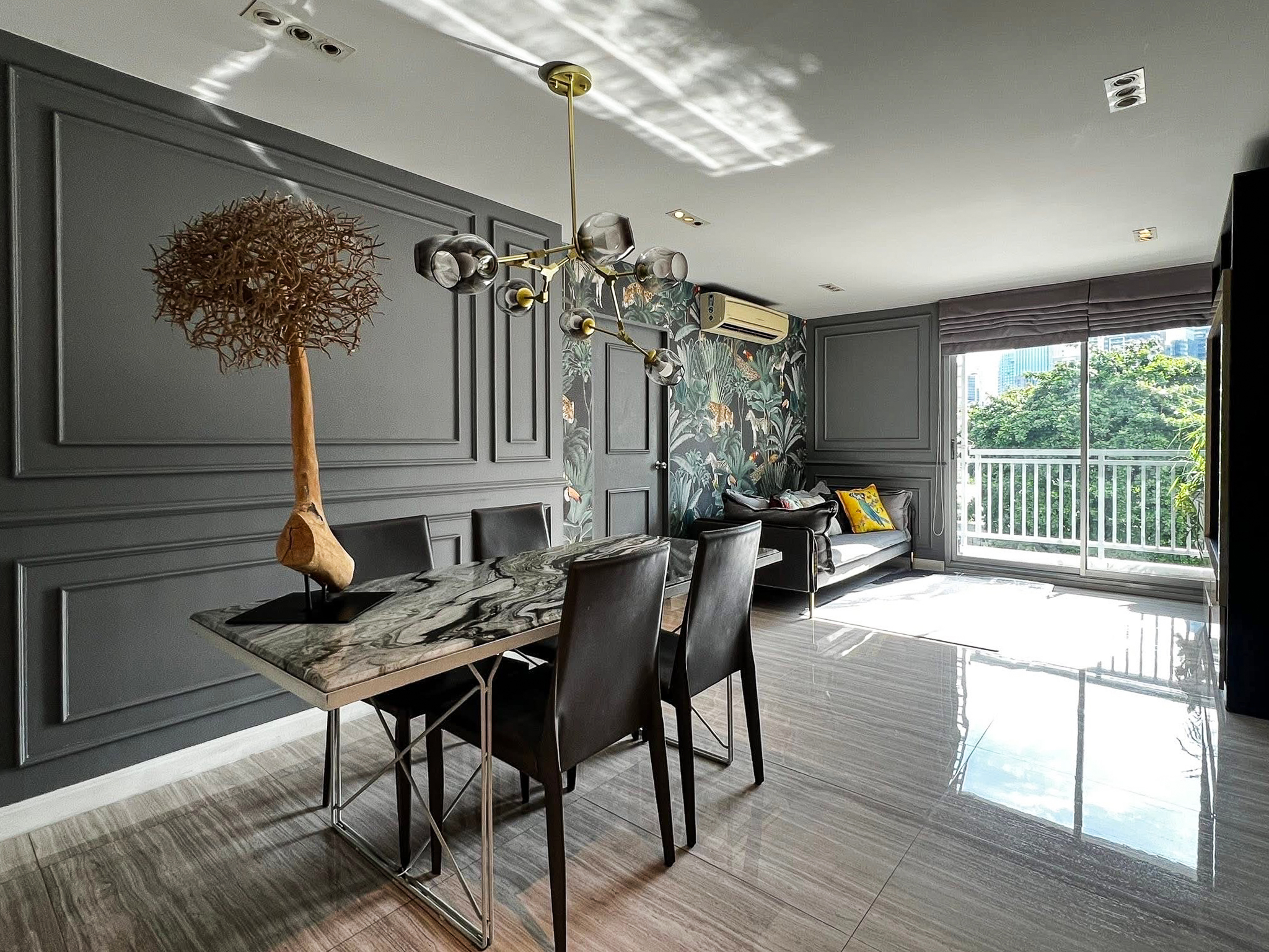 Stylish 2-bedroom condo for rent on Sukhumvit Soi 51 near BTS Thonglor. 80 sqm, peaceful location with green views, designer interiors, walk to EmQuartier & cafes. 48,000 THB/month.