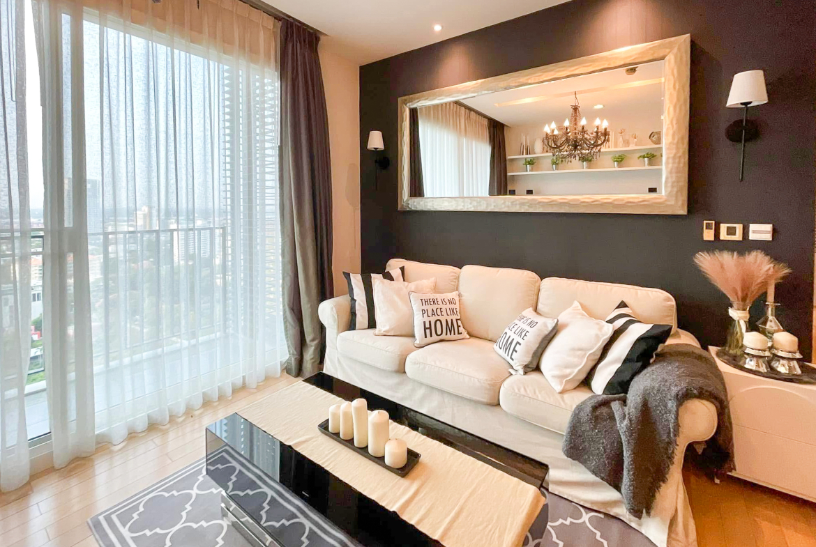 Luxury 2-bedroom condo at SIRI at Sukhumvit for rent and sale. Just 2 minutes walk to BTS Thong Lor. 24th floor with pool view, fully furnished, modern design. Rent 65,000 THB/month or buy for 15.5M THB.