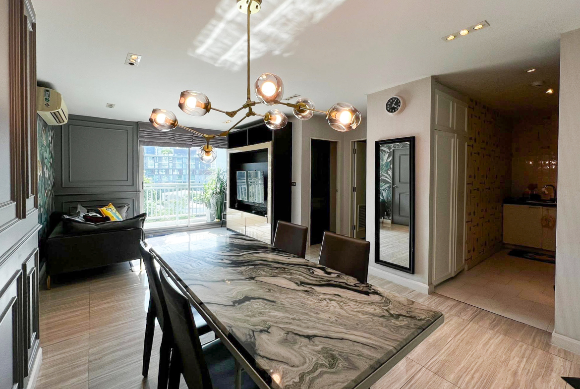 Stylish 2-bedroom condo for rent on Sukhumvit Soi 51 near BTS Thonglor. 80 sqm, peaceful location with green views, designer interiors, walk to EmQuartier & cafes. 48,000 THB/month.
