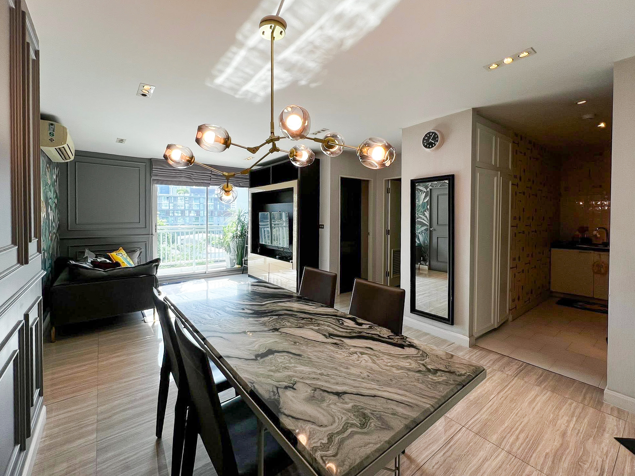 Stylish 2-bedroom condo for rent on Sukhumvit Soi 51 near BTS Thonglor. 80 sqm, peaceful location with green views, designer interiors, walk to EmQuartier & cafes. 48,000 THB/month.