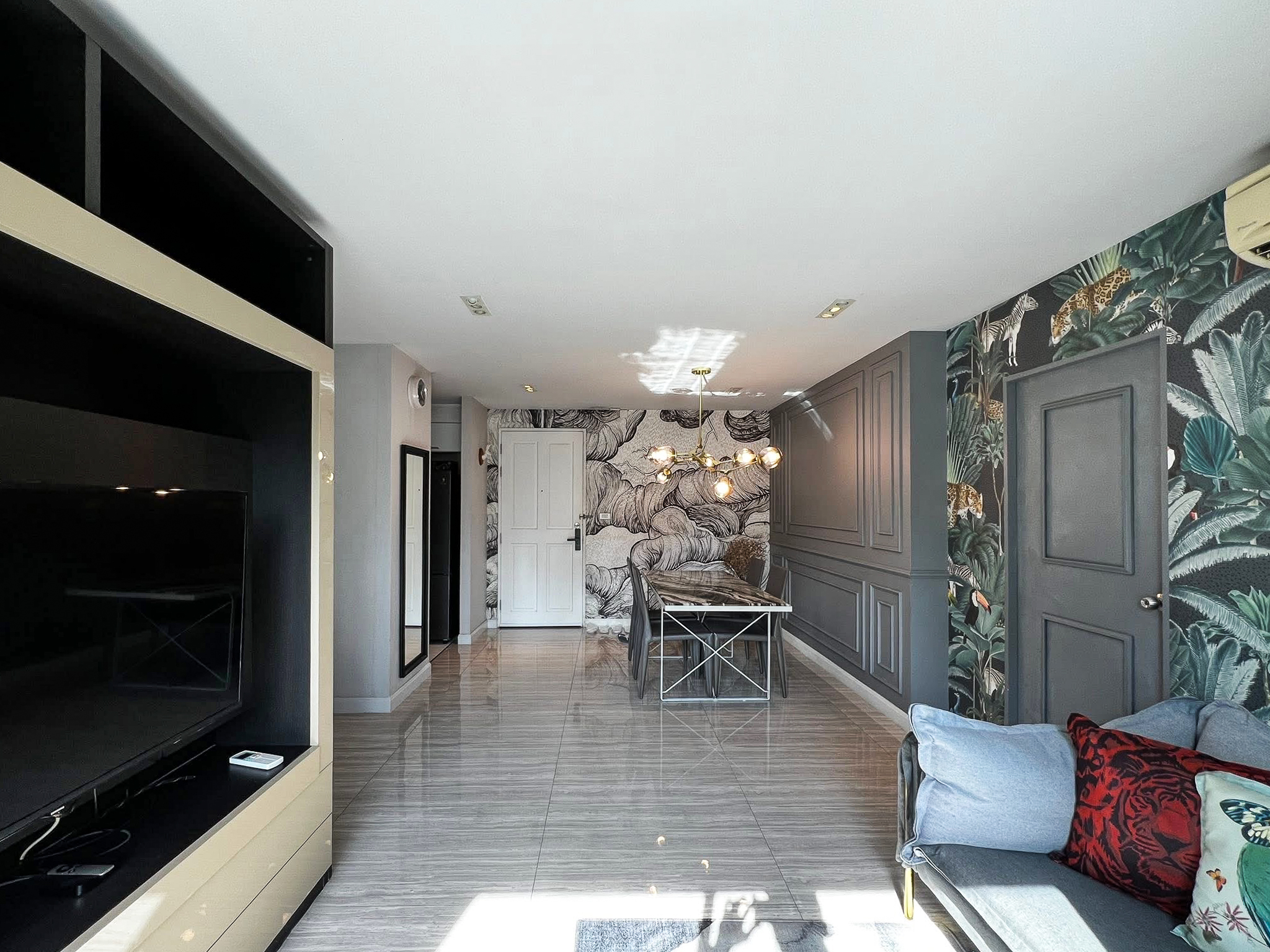 Stylish 2-bedroom condo for rent on Sukhumvit Soi 51 near BTS Thonglor. 80 sqm, peaceful location with green views, designer interiors, walk to EmQuartier & cafes. 48,000 THB/month.
