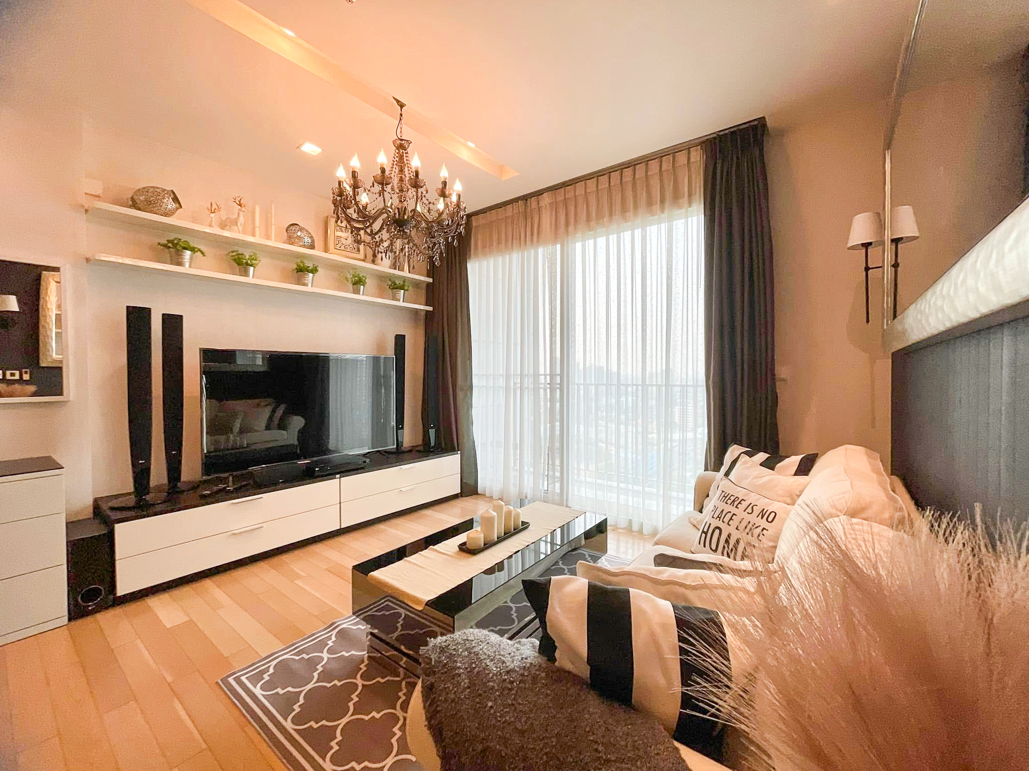 Luxury 2-bedroom condo at SIRI at Sukhumvit for rent and sale. Just 2 minutes walk to BTS Thong Lor. 24th floor with pool view, fully furnished, modern design. Rent 65,000 THB/month or buy for 15.5M THB.
