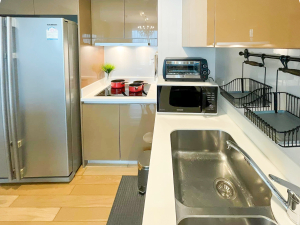 Luxury 2-bedroom condo at SIRI at Sukhumvit for rent and sale. Just 2 minutes walk to BTS Thong Lor. 24th floor with pool view, fully furnished, modern design. Rent 65,000 THB/month or buy for 15.5M THB.