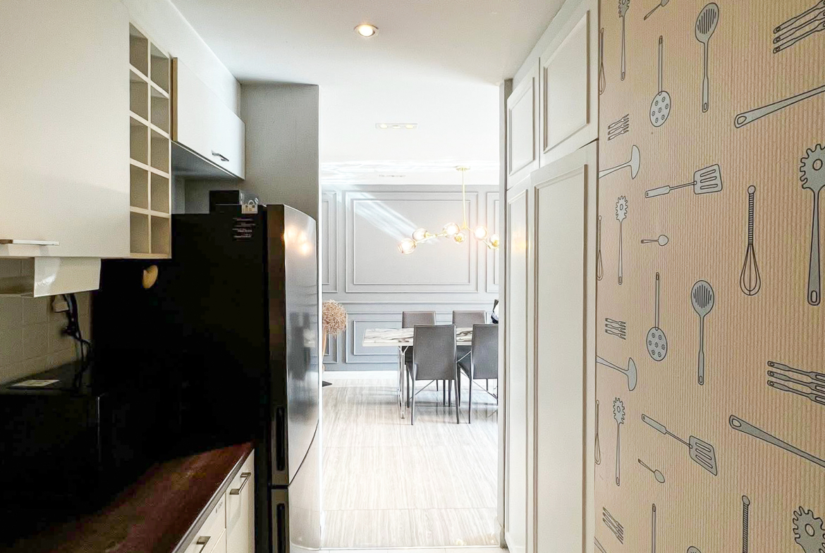 Stylish 2-bedroom condo for rent on Sukhumvit Soi 51 near BTS Thonglor. 80 sqm, peaceful location with green views, designer interiors, walk to EmQuartier & cafes. 48,000 THB/month.