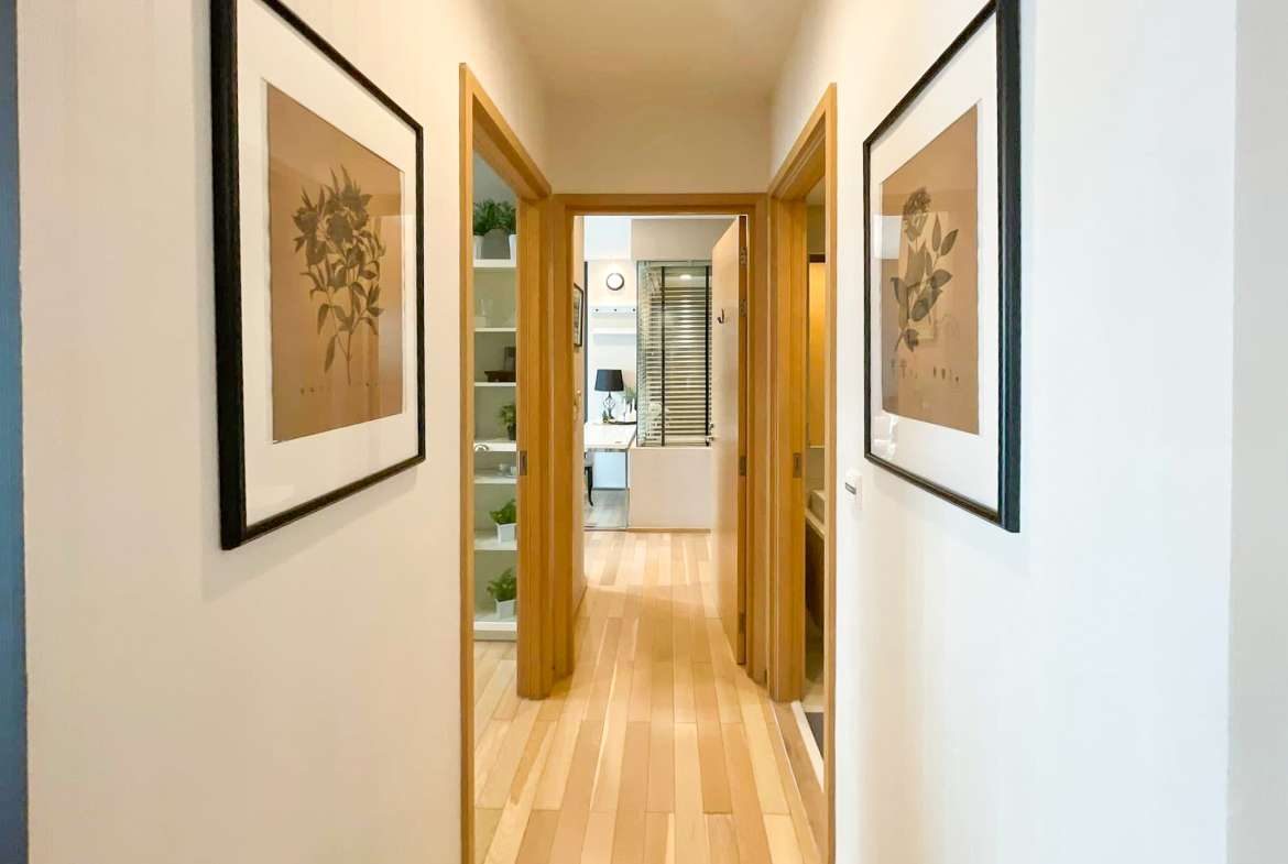 Luxury 2-bedroom condo at SIRI at Sukhumvit for rent and sale. Just 2 minutes walk to BTS Thong Lor. 24th floor with pool view, fully furnished, modern design. Rent 65,000 THB/month or buy for 15.5M THB.