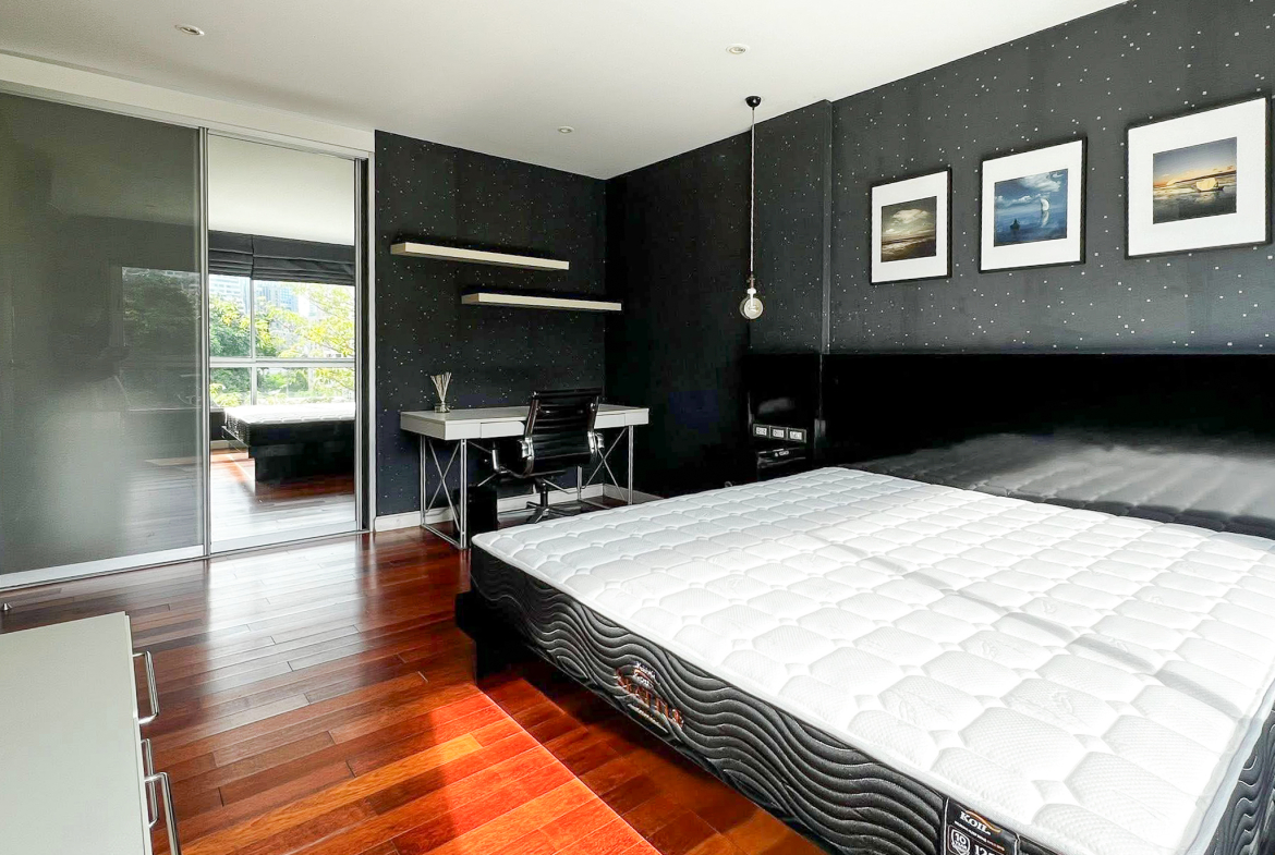 Stylish 2-bedroom condo for rent on Sukhumvit Soi 51 near BTS Thonglor. 80 sqm, peaceful location with green views, designer interiors, walk to EmQuartier & cafes. 48,000 THB/month.