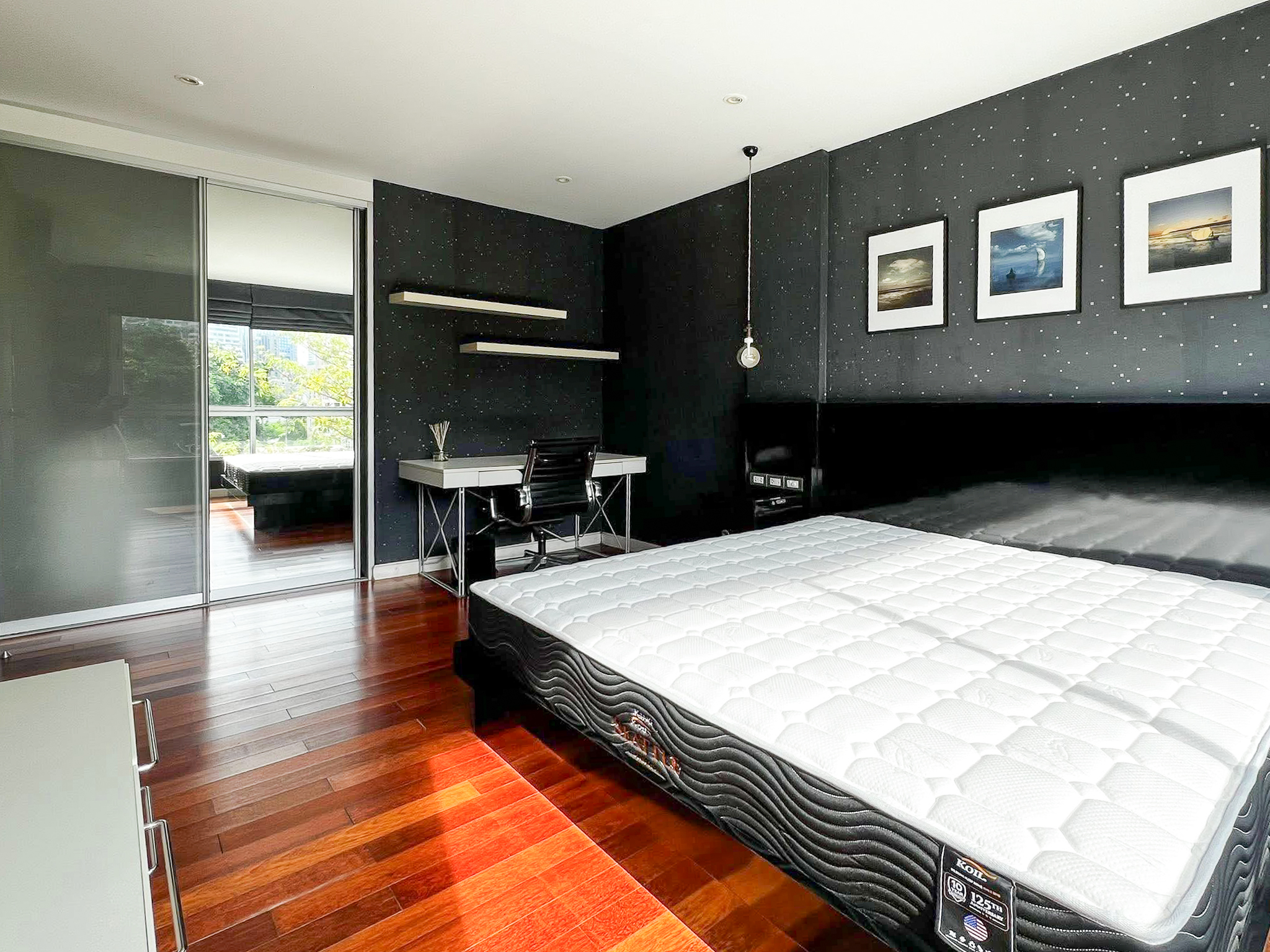 Stylish 2-bedroom condo for rent on Sukhumvit Soi 51 near BTS Thonglor. 80 sqm, peaceful location with green views, designer interiors, walk to EmQuartier & cafes. 48,000 THB/month.