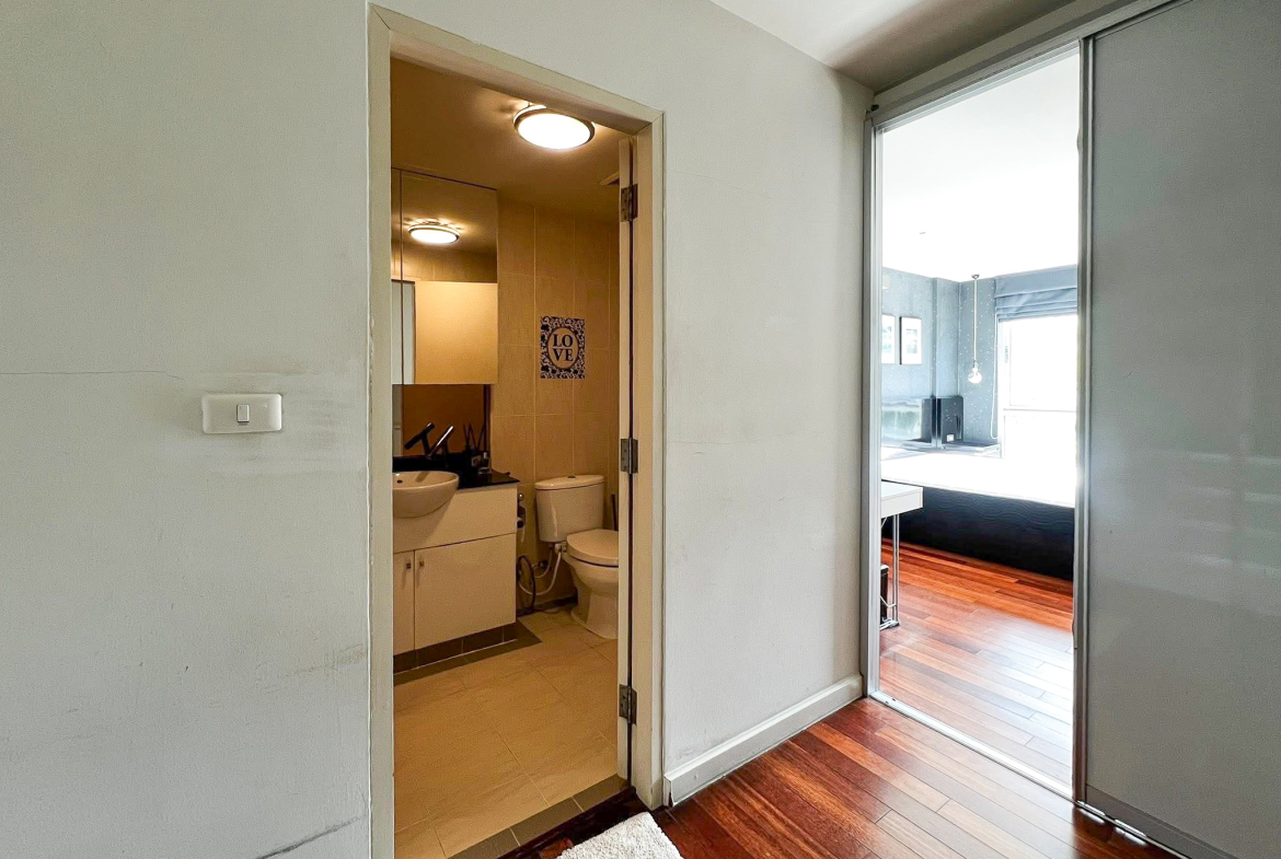 Stylish 2-bedroom condo for rent on Sukhumvit Soi 51 near BTS Thonglor. 80 sqm, peaceful location with green views, designer interiors, walk to EmQuartier & cafes. 48,000 THB/month.