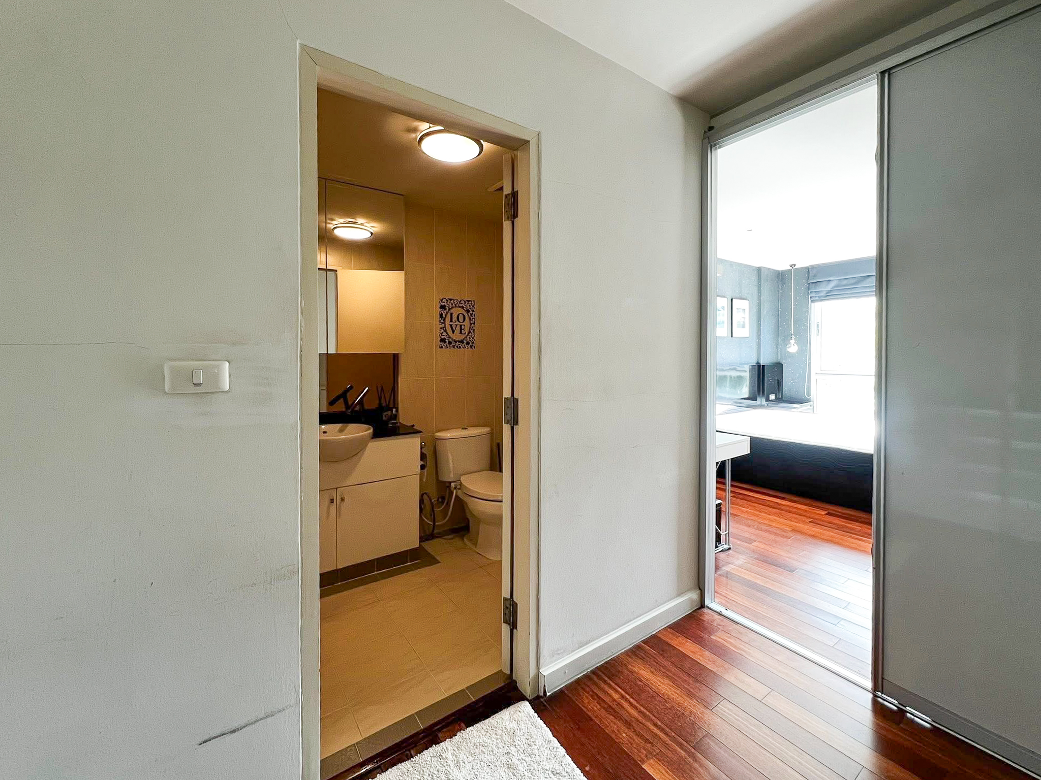 Stylish 2-bedroom condo for rent on Sukhumvit Soi 51 near BTS Thonglor. 80 sqm, peaceful location with green views, designer interiors, walk to EmQuartier & cafes. 48,000 THB/month.