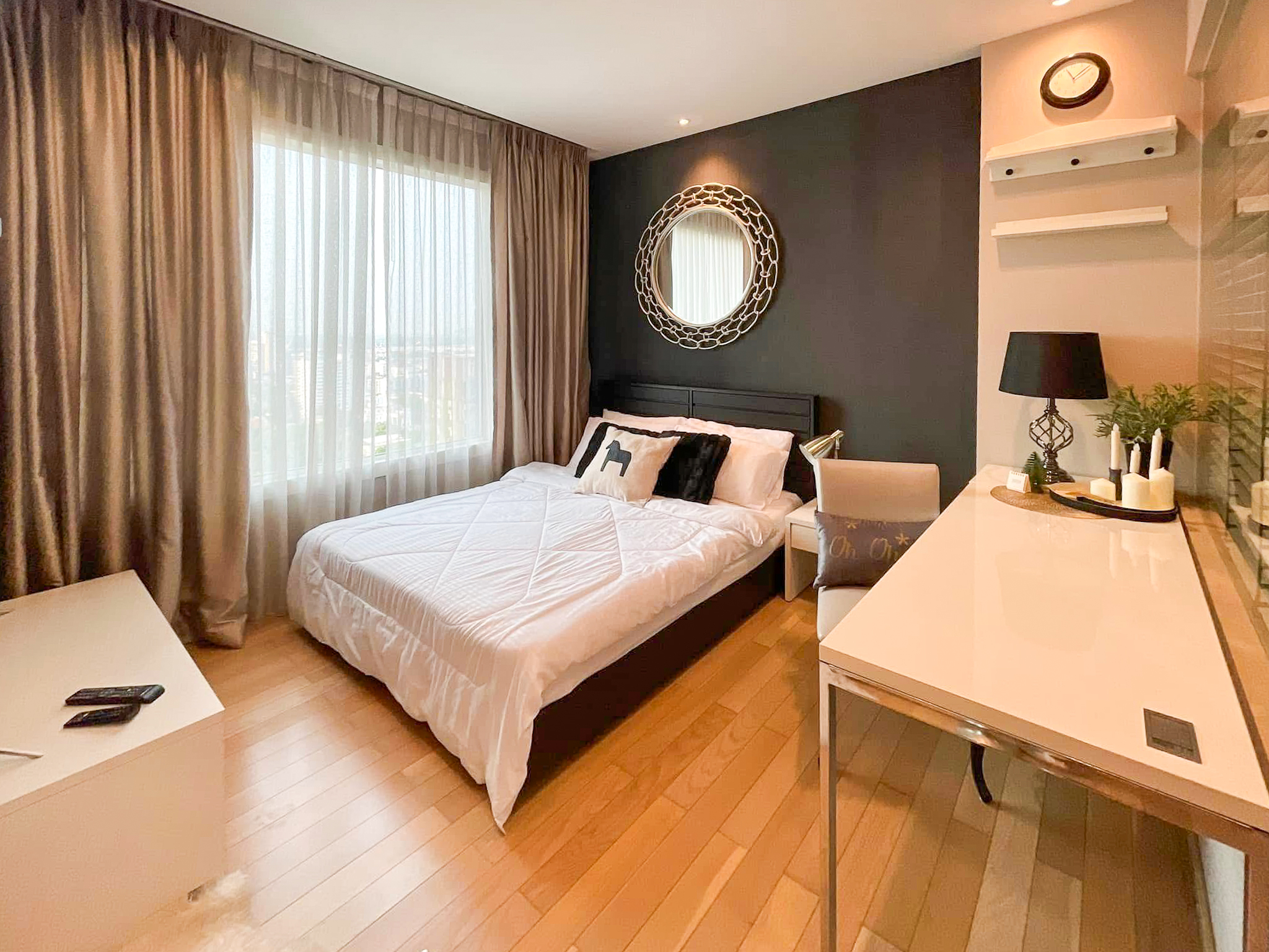 Luxury 2-bedroom condo at SIRI at Sukhumvit for rent and sale. Just 2 minutes walk to BTS Thong Lor. 24th floor with pool view, fully furnished, modern design. Rent 65,000 THB/month or buy for 15.5M THB.