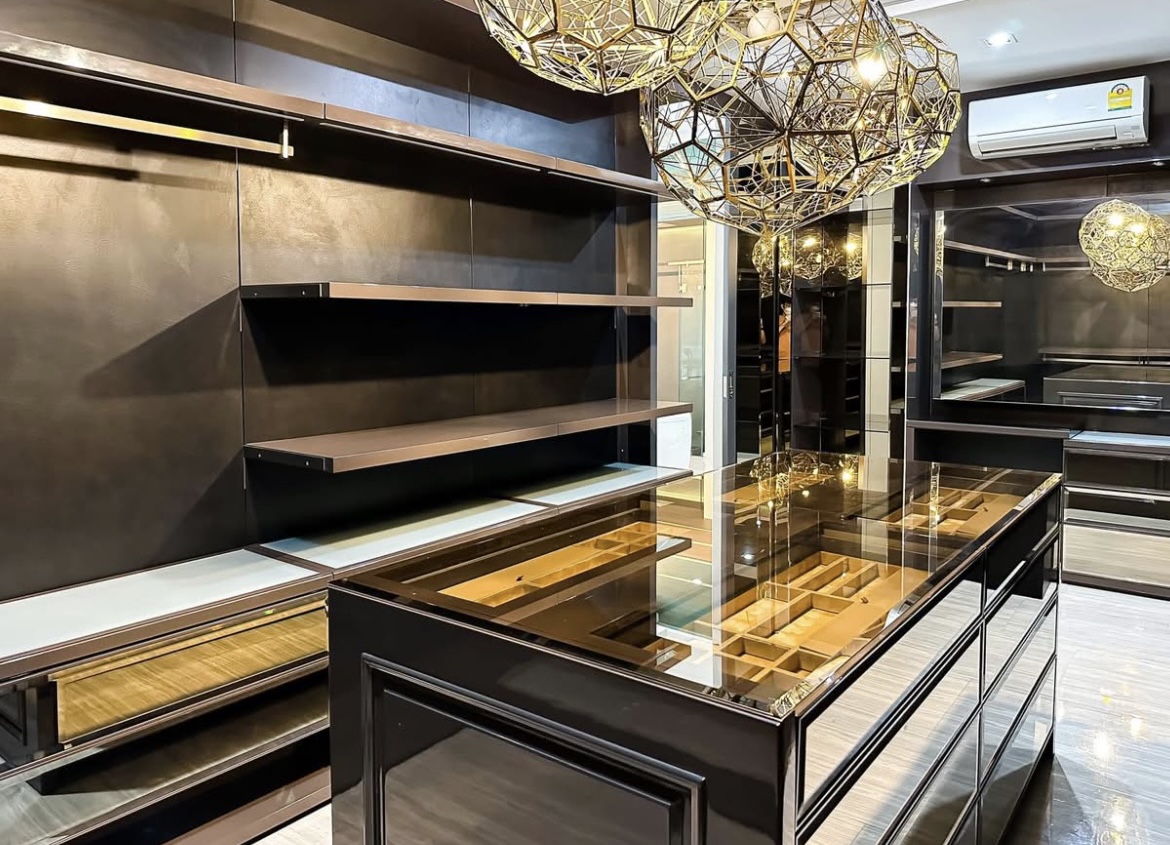 Luxury 3-bedroom penthouse for rent near BTS Asoke, 240 sqm with large walk-in closet, modern kitchen, office space, city view balconies, and premium facilities. 150,000 THB/month.