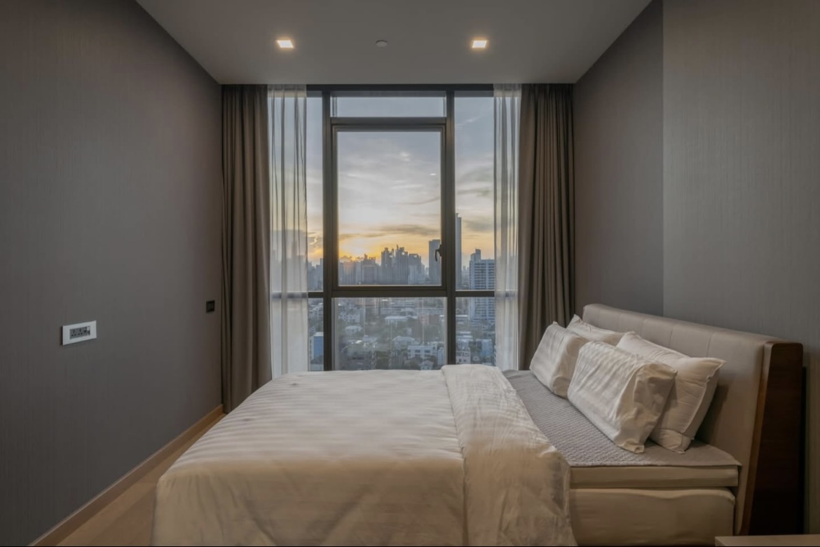 Luxury 2-bedroom condo for sale at The Monument Thonglor, best-positioned unit on the 18th floor with panoramic views, private lift, 2 parking rights, and pet-friendly. Fully furnished. 33.9M THB.