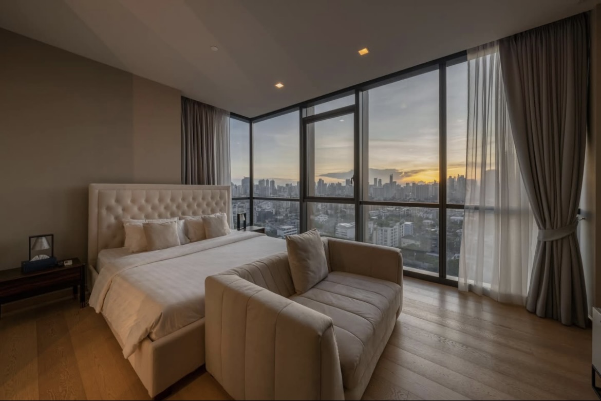 Luxury 2-bedroom condo for sale at The Monument Thonglor, best-positioned unit on the 18th floor with panoramic views, private lift, 2 parking rights, and pet-friendly. Fully furnished. 33.9M THB.
