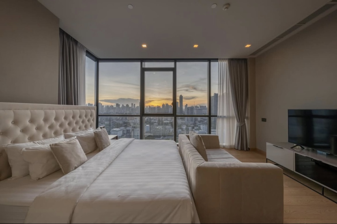 Luxury 2-bedroom condo for sale at The Monument Thonglor, best-positioned unit on the 18th floor with panoramic views, private lift, 2 parking rights, and pet-friendly. Fully furnished. 33.9M THB.