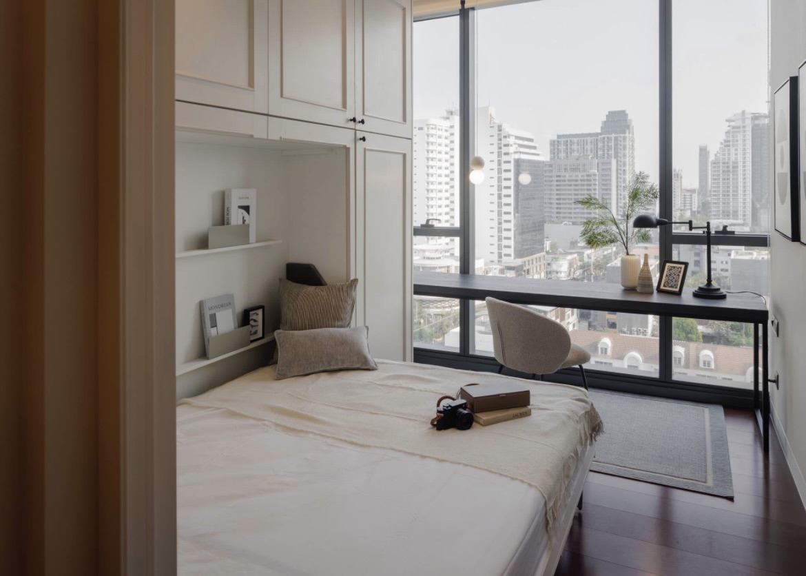 Ultra-luxury 2-bedroom condo for sale and rent at Khun by Yoo Thonglor 12. Fully furnished, newly decorated, 82 sqm with premium amenities, smart home features, and stunning east-facing city views.