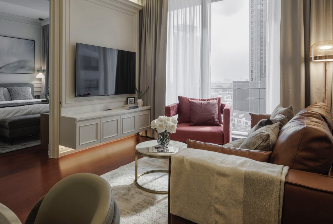 Ultra-luxury 2-bedroom condo for sale and rent at Khun by Yoo Thonglor 12. Fully furnished, newly decorated, 82 sqm with premium amenities, smart home features, and stunning east-facing city views.