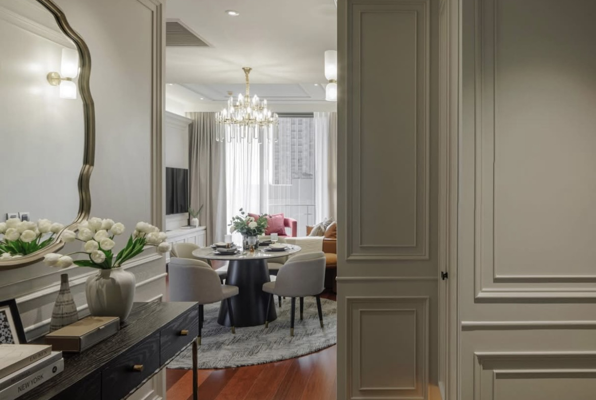Ultra-luxury 2-bedroom condo for sale and rent at Khun by Yoo Thonglor 12. Fully furnished, newly decorated, 82 sqm with premium amenities, smart home features, and stunning east-facing city views.