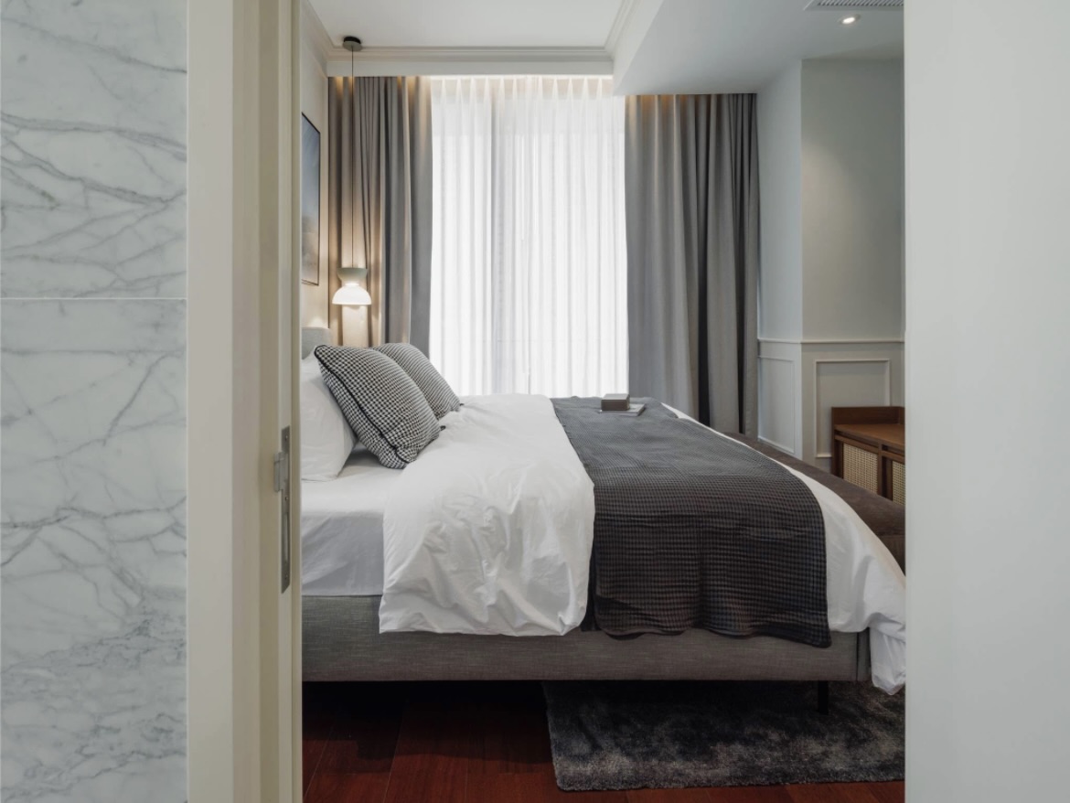 Ultra-luxury 2-bedroom condo for sale and rent at Khun by Yoo Thonglor 12. Fully furnished, newly decorated, 82 sqm with premium amenities, smart home features, and stunning east-facing city views.