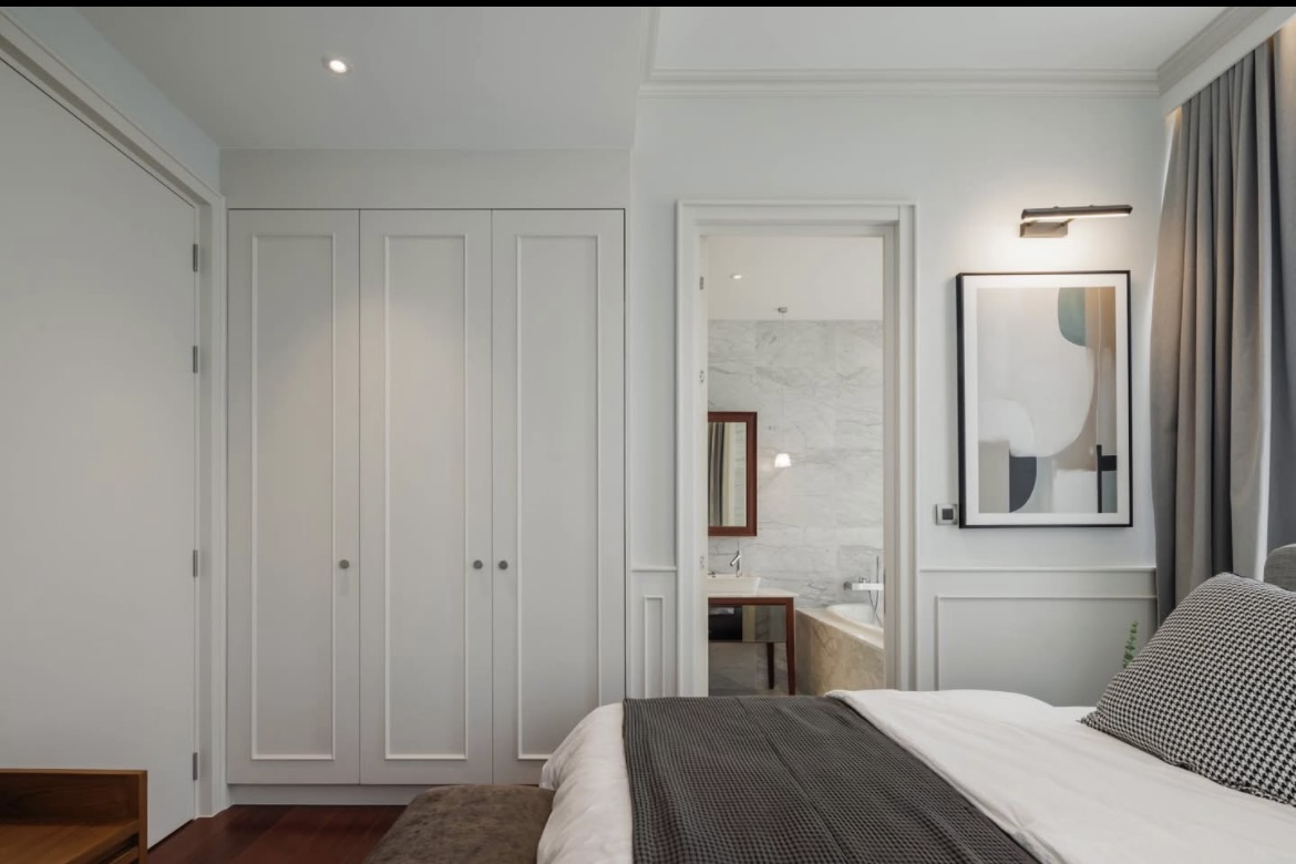 Ultra-luxury 2-bedroom condo for sale and rent at Khun by Yoo Thonglor 12. Fully furnished, newly decorated, 82 sqm with premium amenities, smart home features, and stunning east-facing city views.