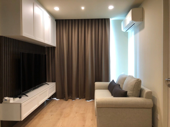 Modern 2-bedroom condo for rent at Noble Recole Sukhumvit 19, 64 sq.m. on the 8th floor, fully furnished, just minutes from BTS Asoke and Terminal 21. 46,000 THB/month.