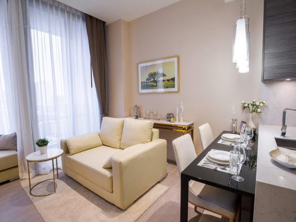 Luxury 1-bedroom condo for rent at The ESSE Asoke, fully furnished with clear city view. Prime location near BTS Asoke. High-end facilities. 47.5 sqm, 47,000 THB/month.