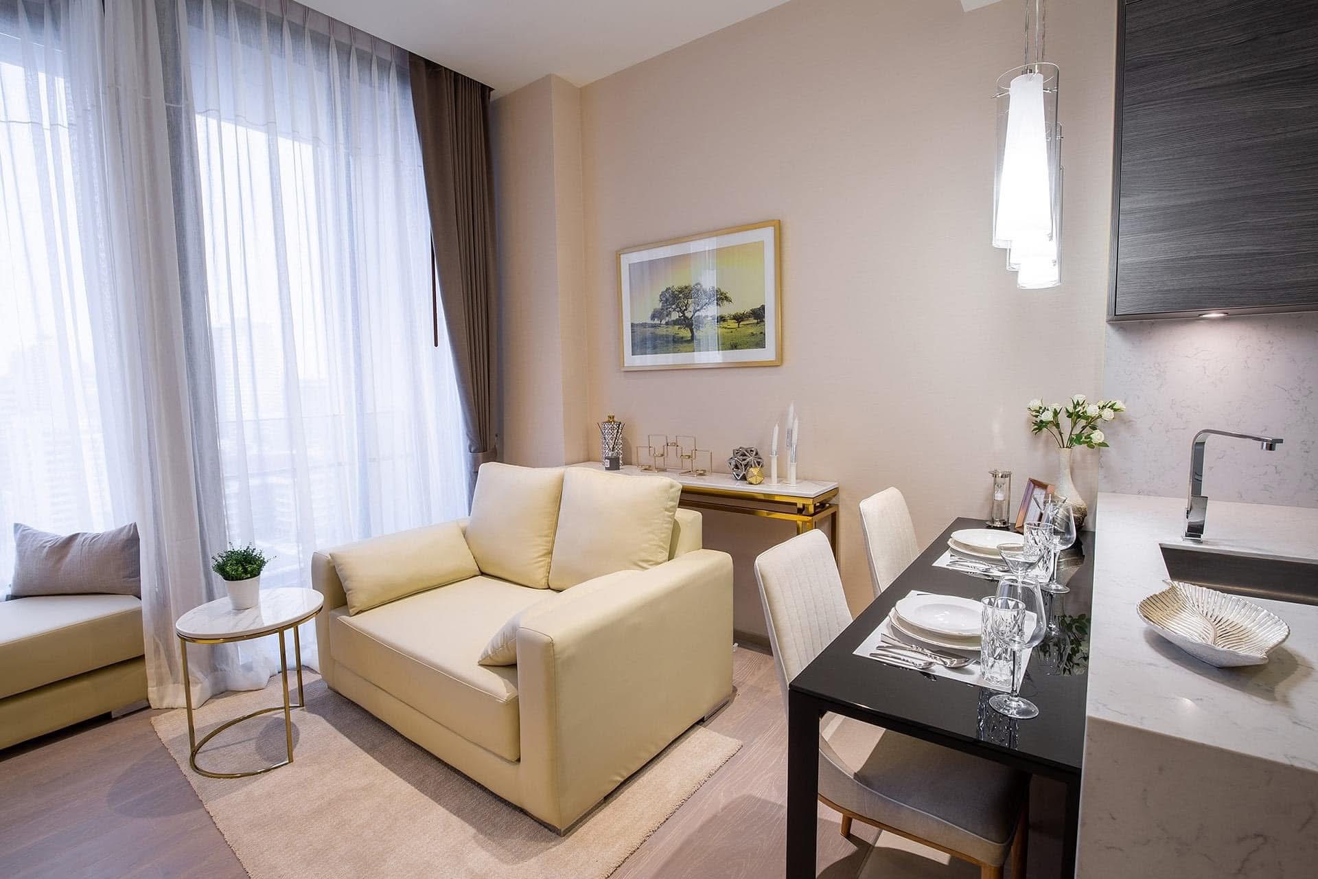 Luxury 1-bedroom condo for rent at The ESSE Asoke, fully furnished with clear city view. Prime location near BTS Asoke. High-end facilities. 47.5 sqm, 47,000 THB/month.
