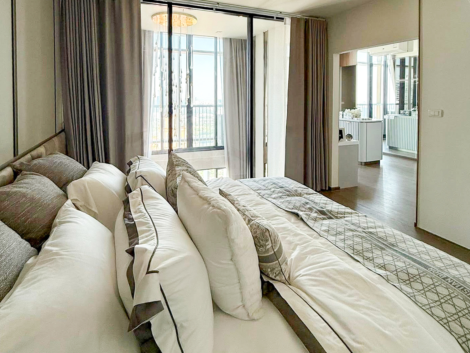 Luxury 2-bedroom duplex condo for sale at Park Origin Phrom Phong, 88 sqm on the 45th floor, fully furnished with exclusive Christian Dior decor. Stunning panoramic city views. Walk to BTS Phrom Phong and EmQuartier. Only 19.99 MB.