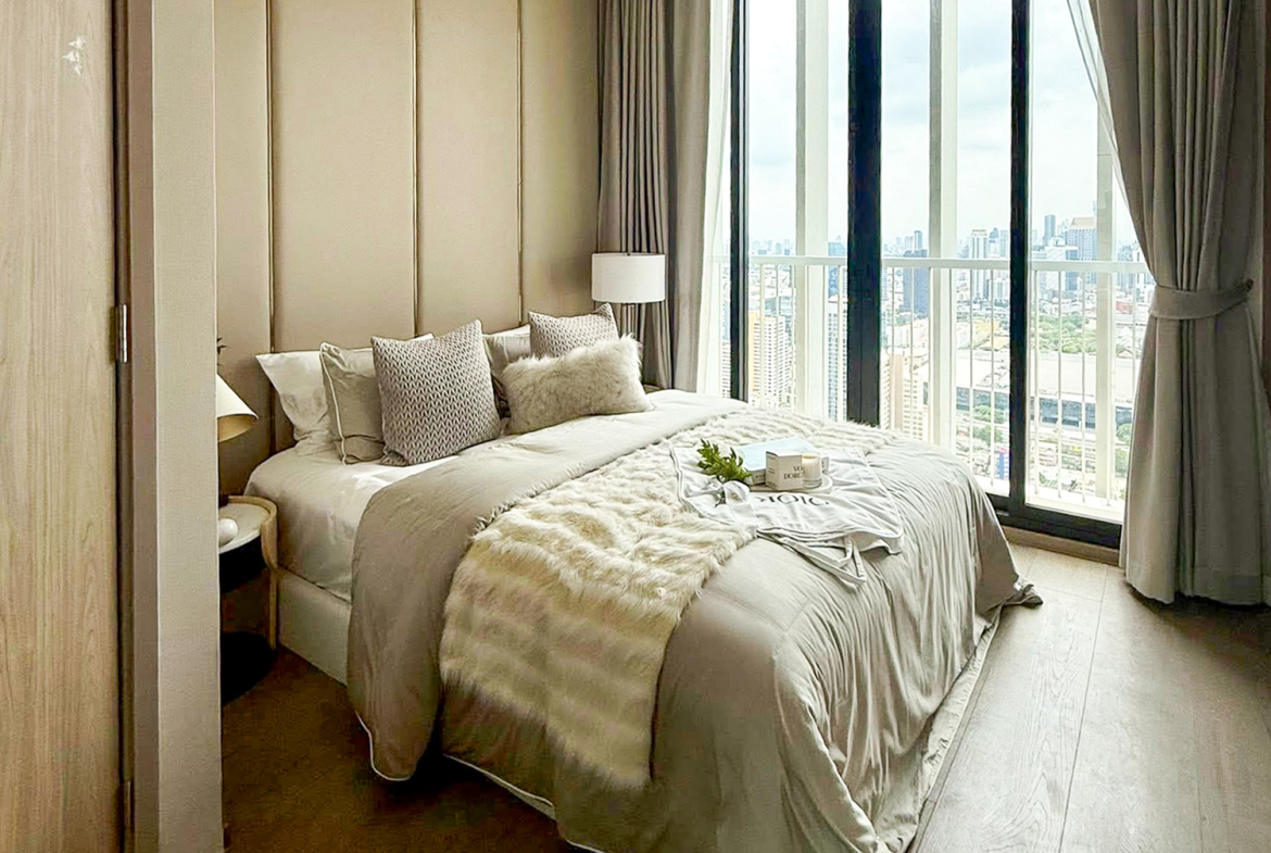 Luxury 2-bedroom duplex condo for sale at Park Origin Phrom Phong, 88 sqm on the 45th floor, fully furnished with exclusive Christian Dior decor. Stunning panoramic city views. Walk to BTS Phrom Phong and EmQuartier. Only 19.99 MB.