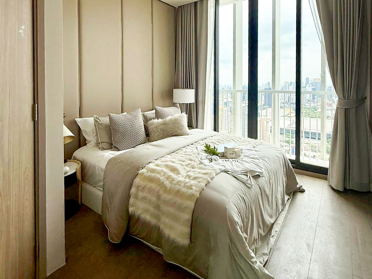 Luxury 2-bedroom duplex condo for sale at Park Origin Phrom Phong, 88 sqm on the 45th floor, fully furnished with exclusive Christian Dior decor. Stunning panoramic city views. Walk to BTS Phrom Phong and EmQuartier. Only 19.99 MB.