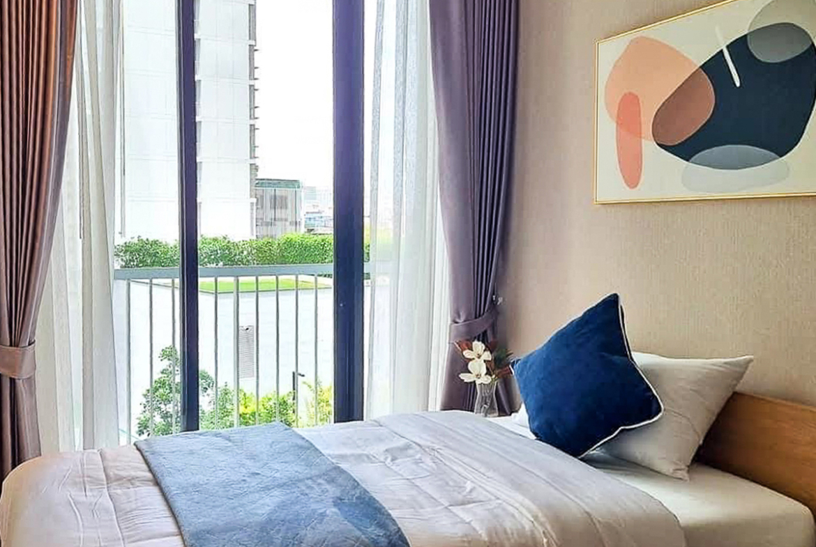 Modern 2-bedroom condo for rent at Park Origin 24, Phrom Phong. Fully furnished, garden view, 52 sqm, luxury amenities, near BTS & EM District. Rent: 45,000 THB/month.