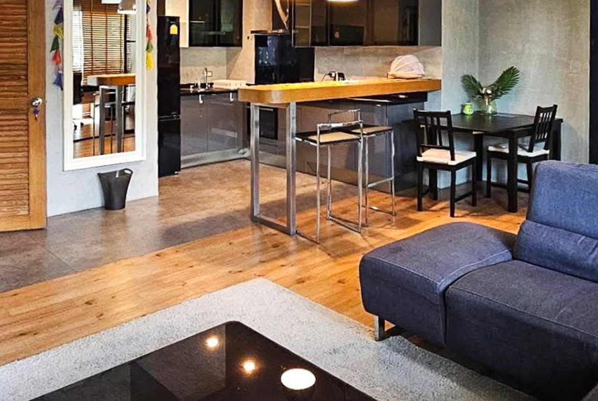 Spacious 2-bedroom condo for rent at Von Napa Sukhumvit 38, just steps from BTS Thong Lor. 105 sqm, modern design, rooftop pool, gym, parking. Rent 55,000 THB/month.