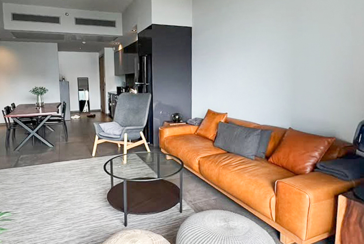 Modern 2-bedroom condo for rent at The Loft Asoke, 87 sqm, fully furnished, quiet city view, 8th floor. Includes kitchen, washer-dryer, 2 TVs. Rent 75,000 THB/month.