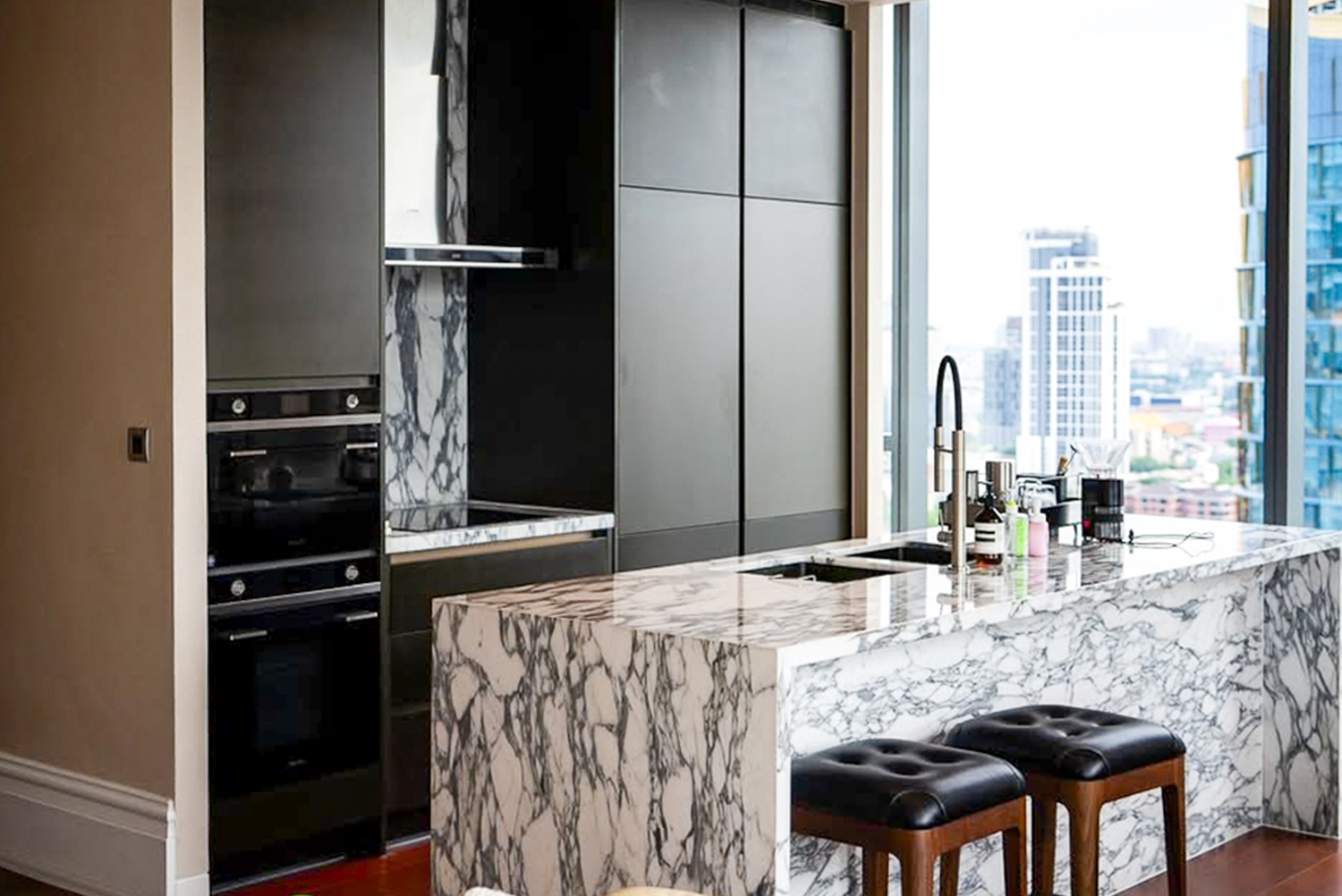 Luxury 3-bedroom corner condo for sale or rent at Khun by Yoo Thonglor 12. High floor, 149.5 sqm, marble kitchen, city views. Sale: 75MB, Rent: 275,000 THB/month. World-class facilities.