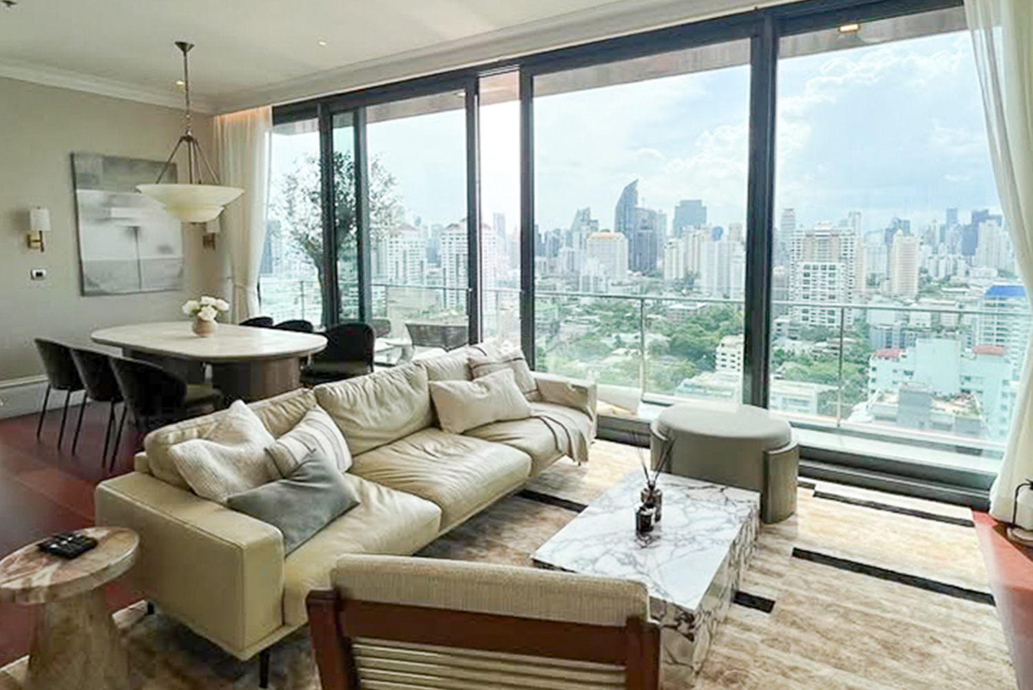 Luxury 3-bedroom corner condo for sale or rent at Khun by Yoo Thonglor 12. High floor, 149.5 sqm, marble kitchen, city views. Sale: 75MB, Rent: 275,000 THB/month. World-class facilities.