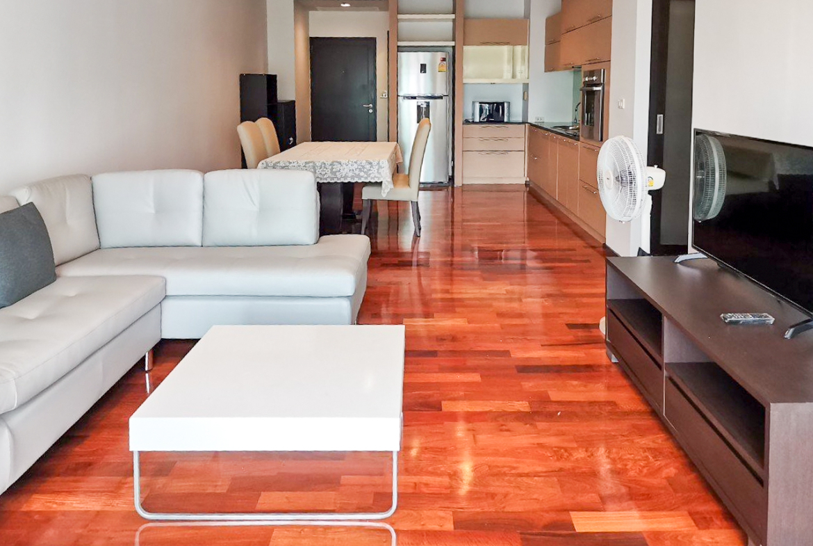 108 sqm 2-bedroom condo for rent on Sukhumvit 55. Fully furnished, high floor, modern kitchen, city view, 50,000 THB/month with full facilities.