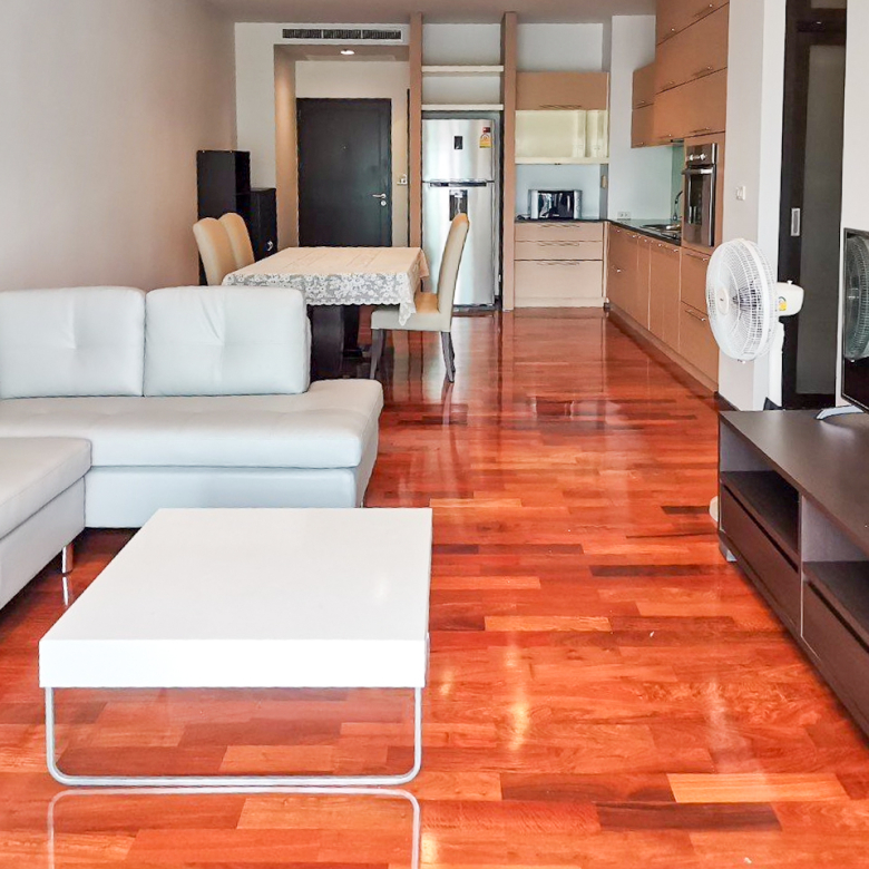 108 sqm 2-bedroom condo for rent on Sukhumvit 55. Fully furnished, high floor, modern kitchen, city view, 50,000 THB/month with full facilities.