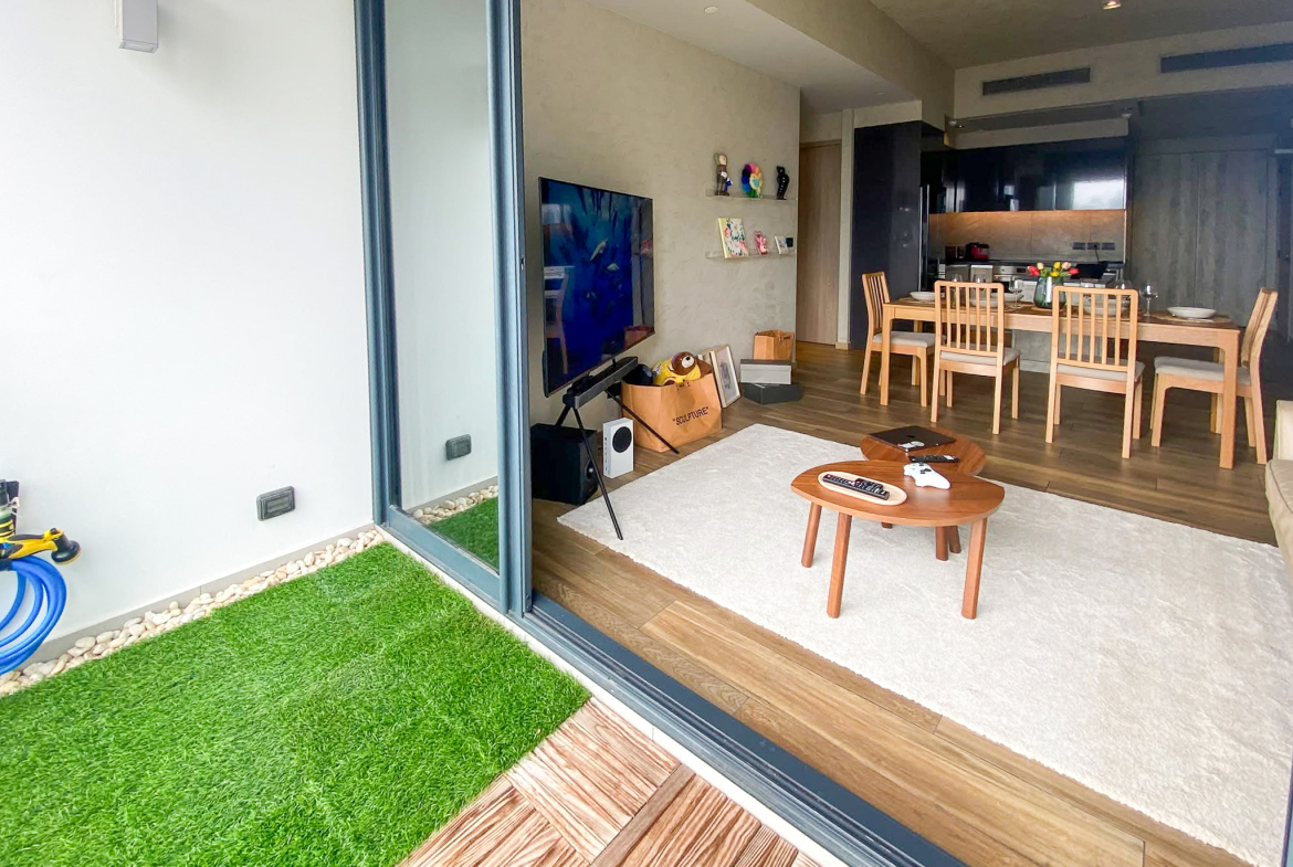 Rent this high-floor 2-bedroom condo at The Lofts Asoke with stunning city views, premium appliances, and luxury amenities. Prime Asoke location. 65,000 THB/month.