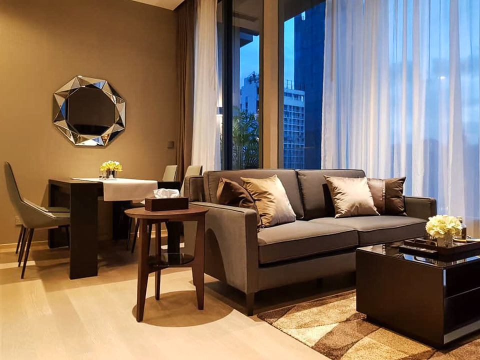 Luxury high-floor 2-bedroom condo for rent at The ESSE Asoke. Fully furnished with skyline views, top facilities, and prime Asoke location. Rent 70,000 THB/month.