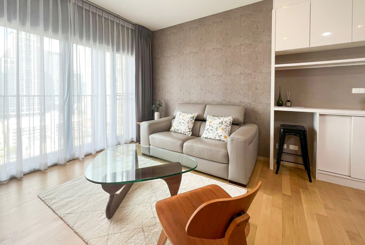 Spacious 2-bedroom, 2-bathroom condo for rent at Noble Reveal Ekkamai. Only 300m from BTS, fully furnished, 75 sqm, with indoor pool and gym. Rent: 60,000 THB/month.