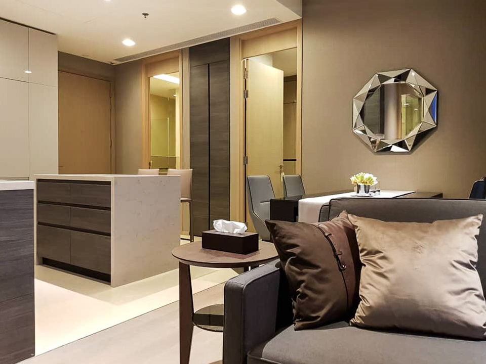 Luxury high-floor 2-bedroom condo for rent at The ESSE Asoke. Fully furnished with skyline views, top facilities, and prime Asoke location. Rent 70,000 THB/month.