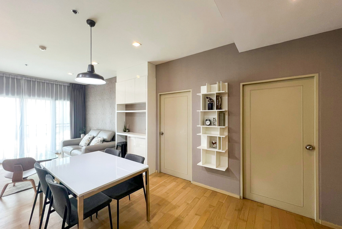 Spacious 2-bedroom, 2-bathroom condo for rent at Noble Reveal Ekkamai. Only 300m from BTS, fully furnished, 75 sqm, with indoor pool and gym. Rent: 60,000 THB/month.