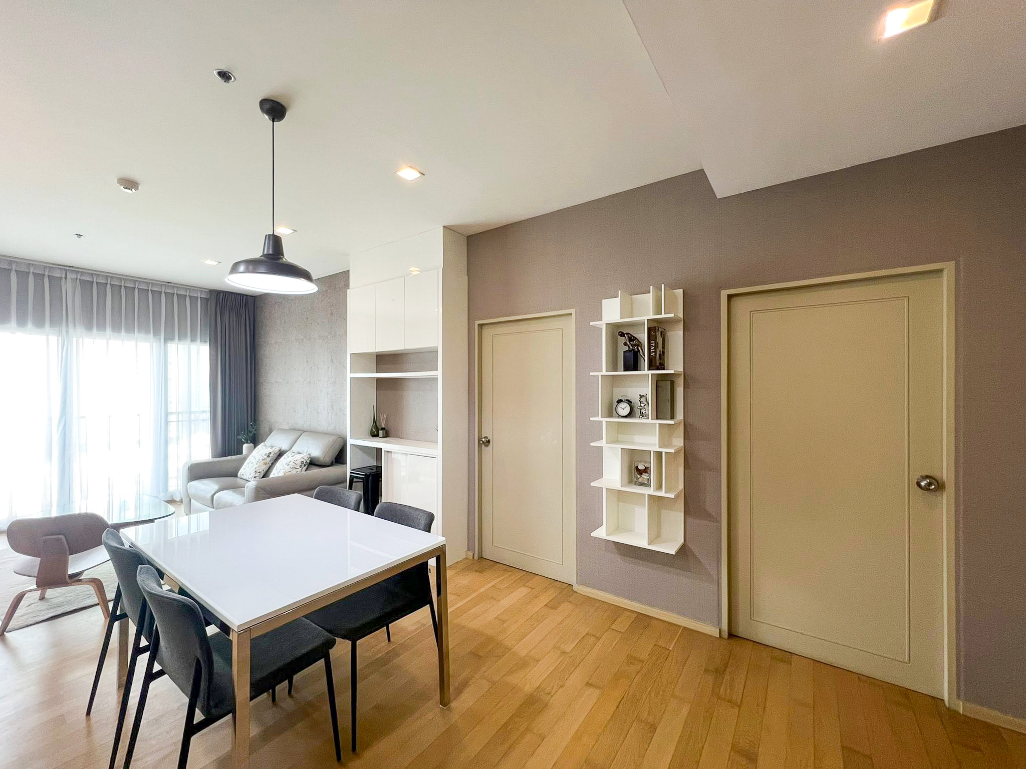 Spacious 2-bedroom, 2-bathroom condo for rent at Noble Reveal Ekkamai. Only 300m from BTS, fully furnished, 75 sqm, with indoor pool and gym. Rent: 60,000 THB/month.