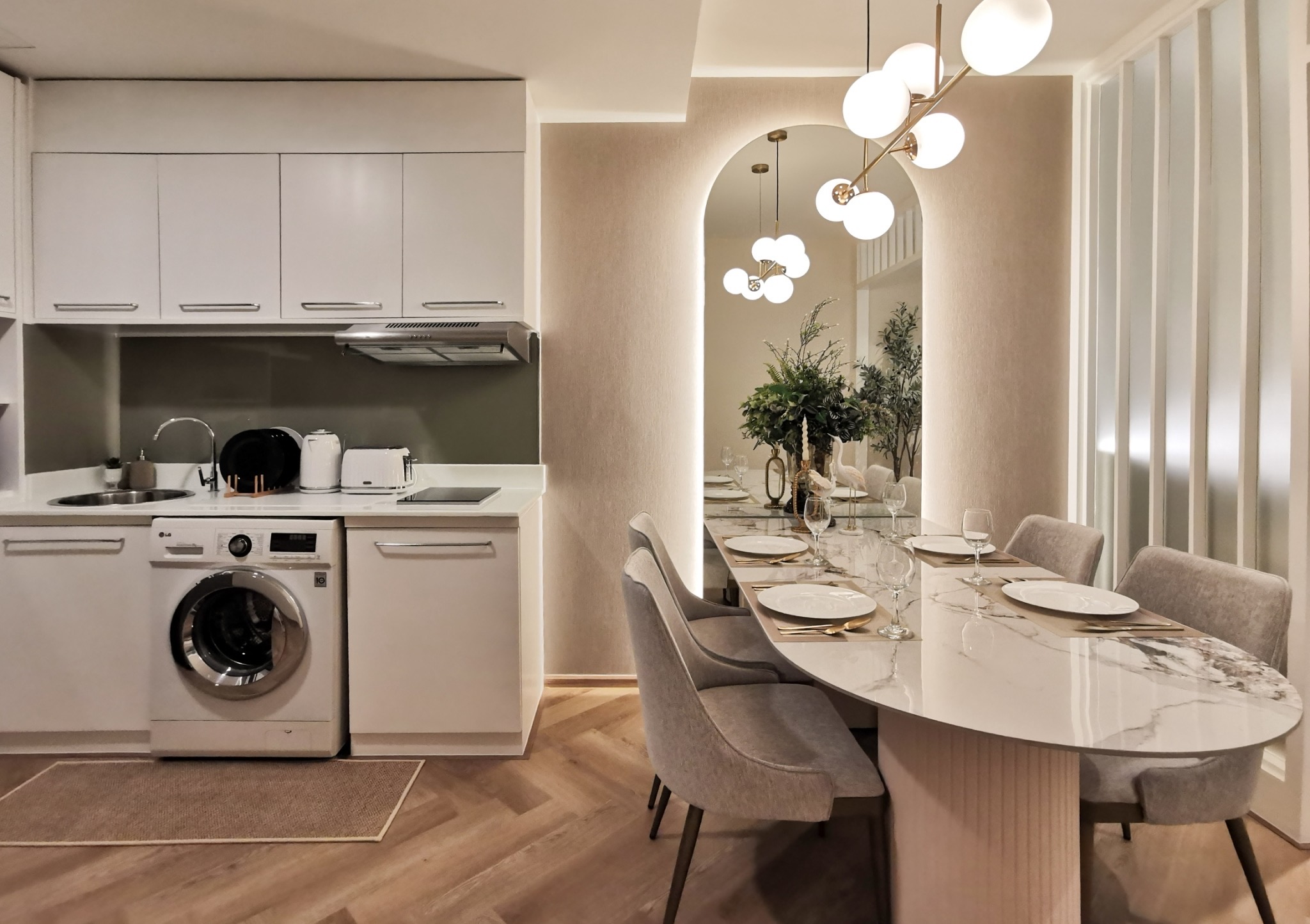 Renovated one-bedroom condo for sale in Phrom Phong, 52 sqm, high floor, unblocked city view, fully furnished, modern interior, with bathtub and top facilities.