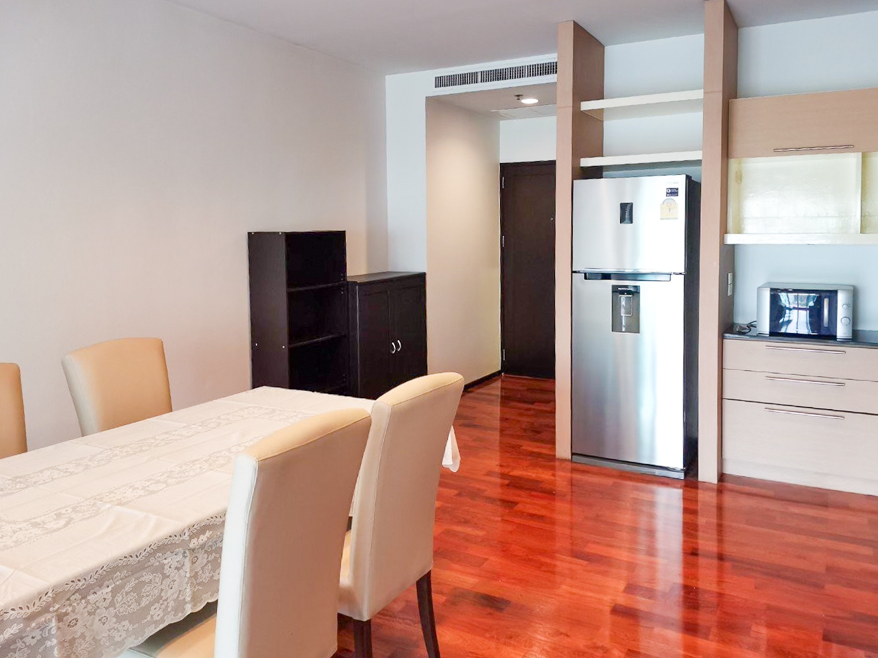 108 sqm 2-bedroom condo for rent on Sukhumvit 55. Fully furnished, high floor, modern kitchen, city view, 50,000 THB/month with full facilities.