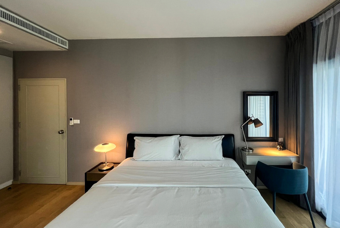 Spacious 2-bedroom, 2-bathroom condo for rent at Noble Reveal Ekkamai. Only 300m from BTS, fully furnished, 75 sqm, with indoor pool and gym. Rent: 60,000 THB/month.